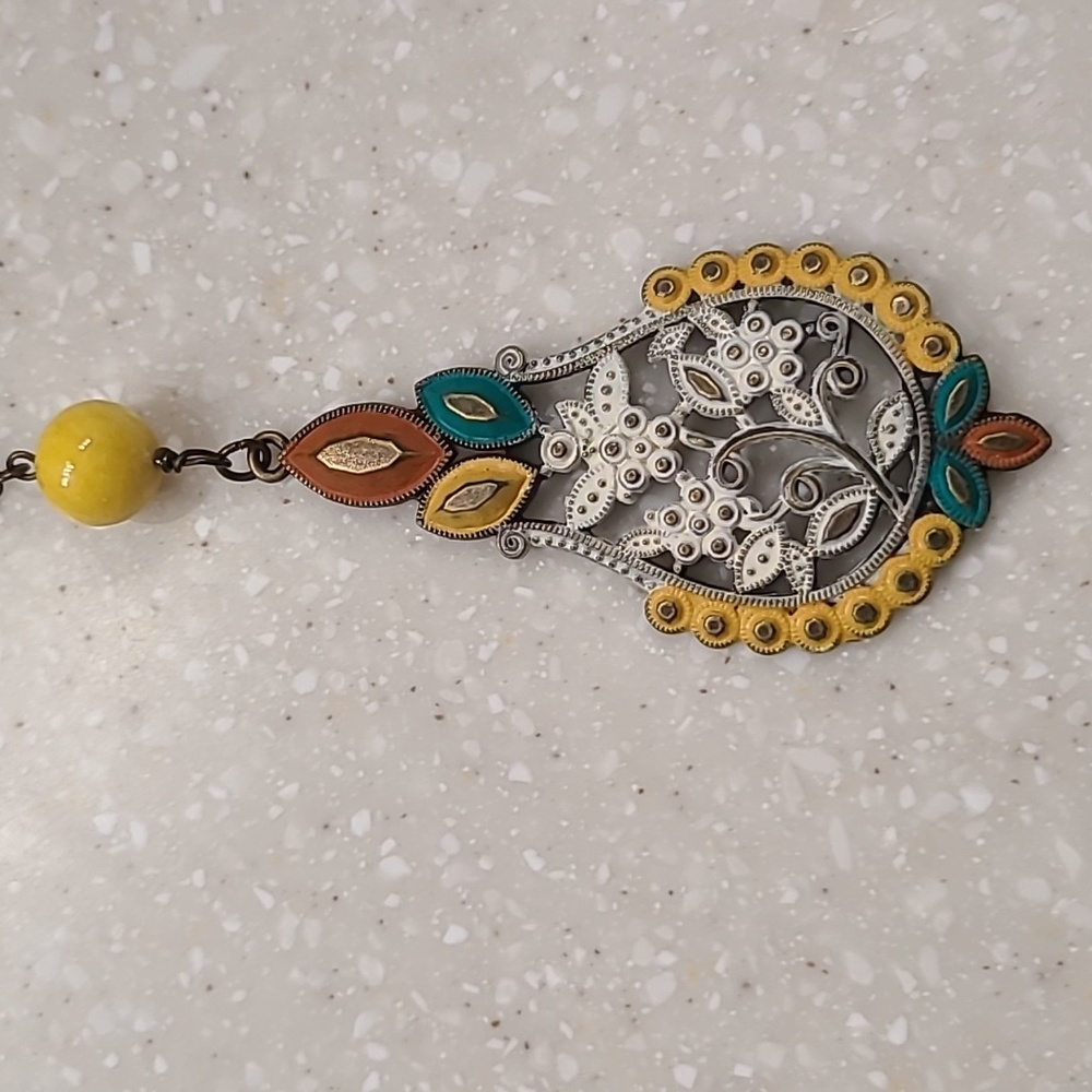 Necklace with bronze looking chain.